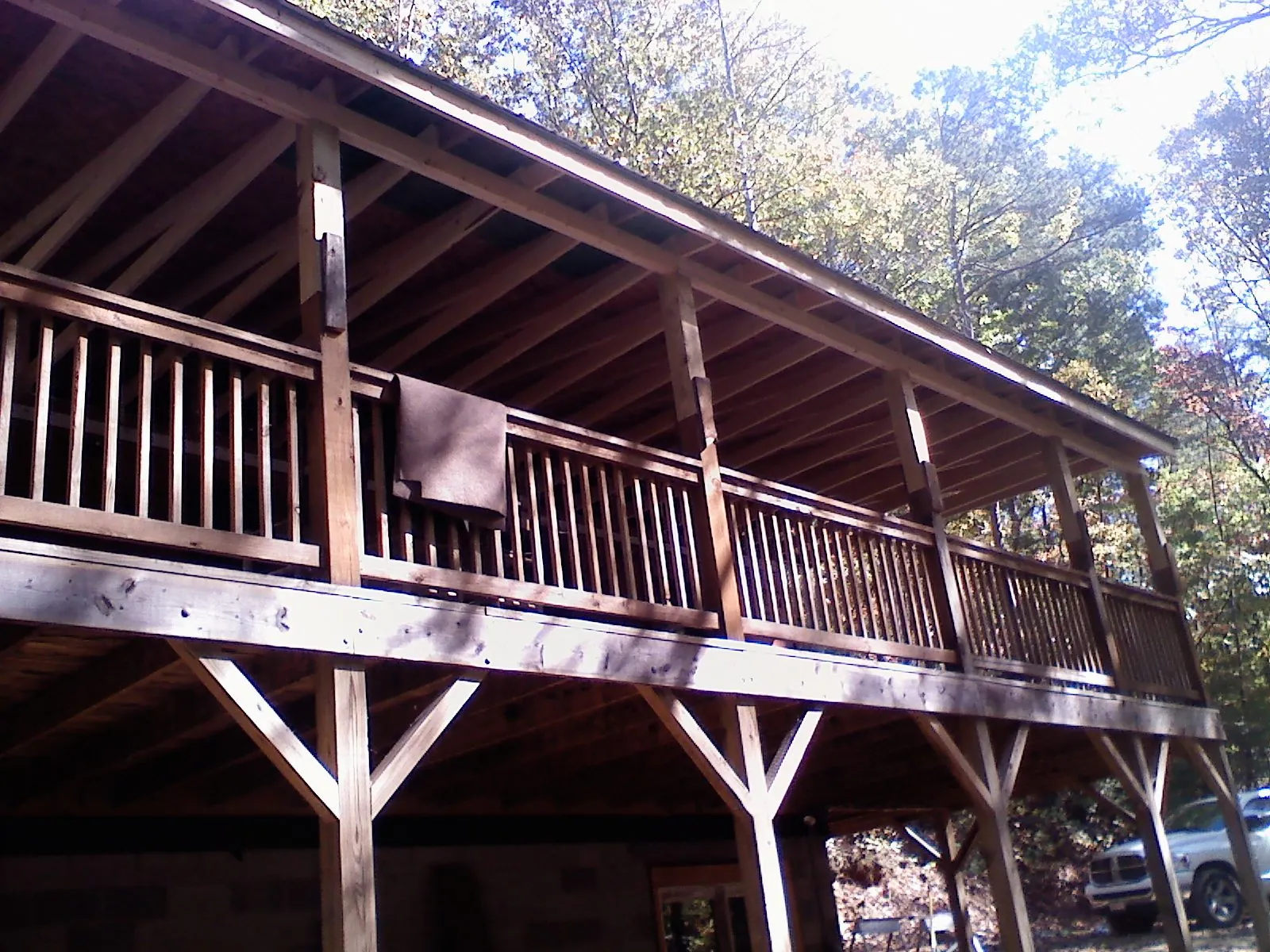 Timber framing under a new elevated porch and deck — Roof Leak Repair in Aquebogue by Roofing Brothers